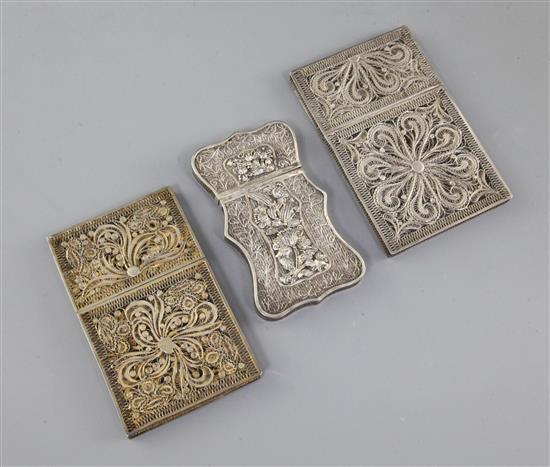 Three 19th century silver filigree work card cases largest 10 x 6.5cm